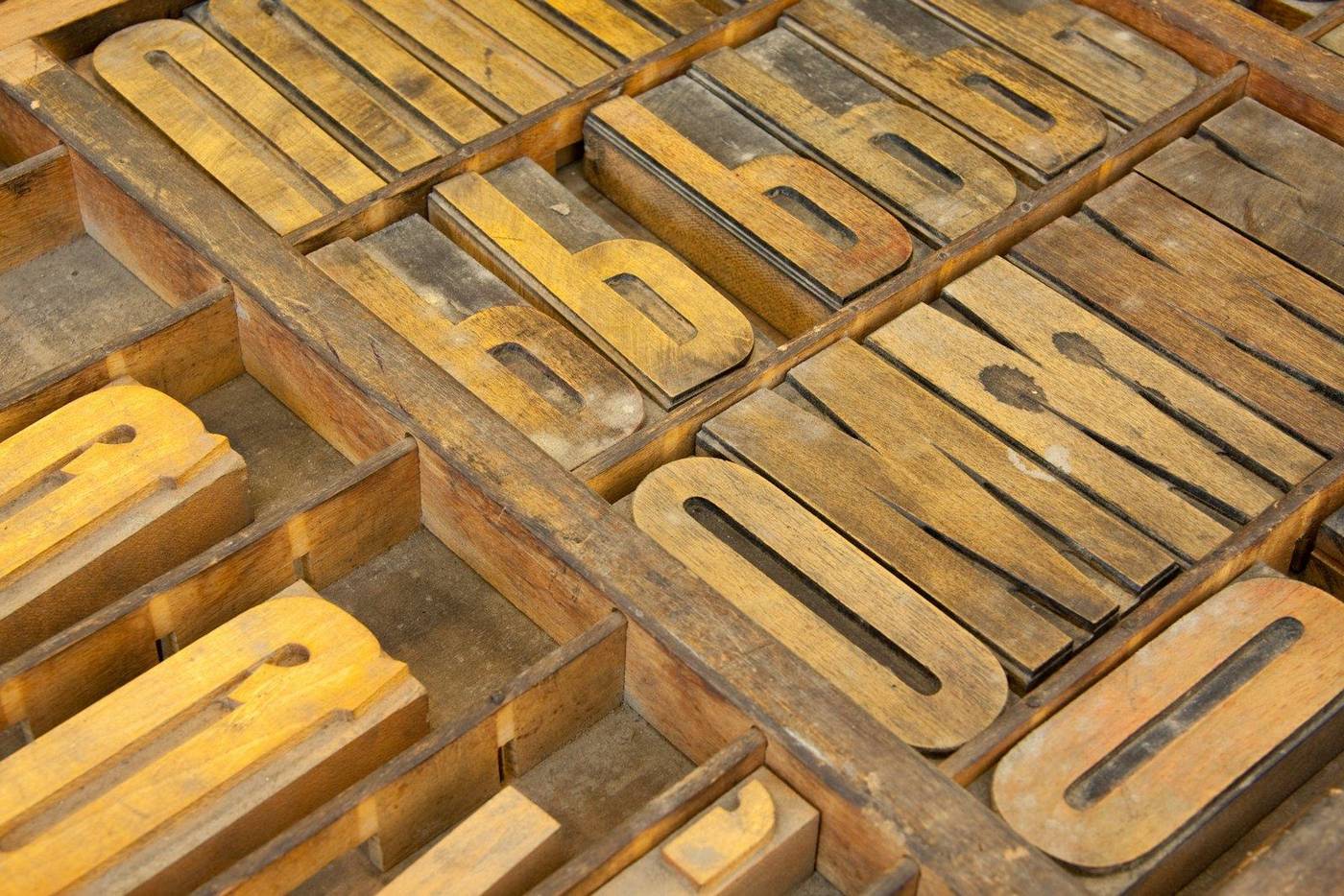 A pile of old wooden letterpress type